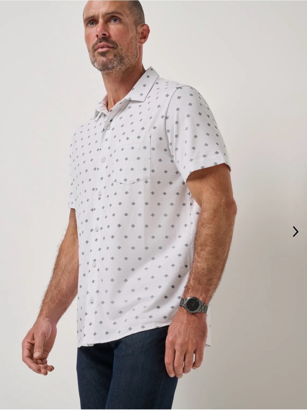 Travis Mathew Men's Short-Sleeve Polo Shirt with Subtle Geometric Print
